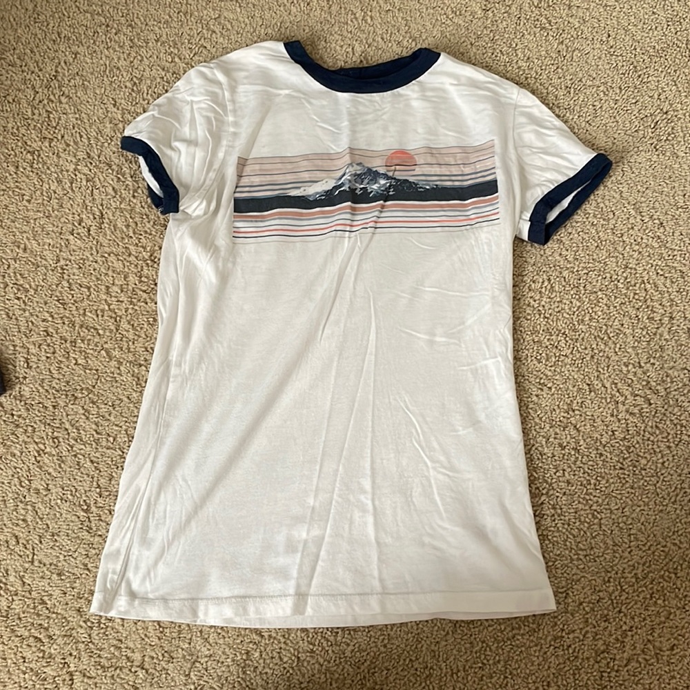 White T-Shirt with Graphics on it